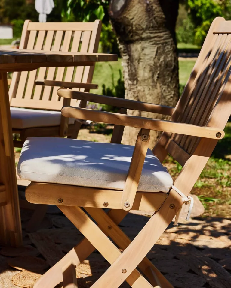 Wooden garden armchair with folding cushion