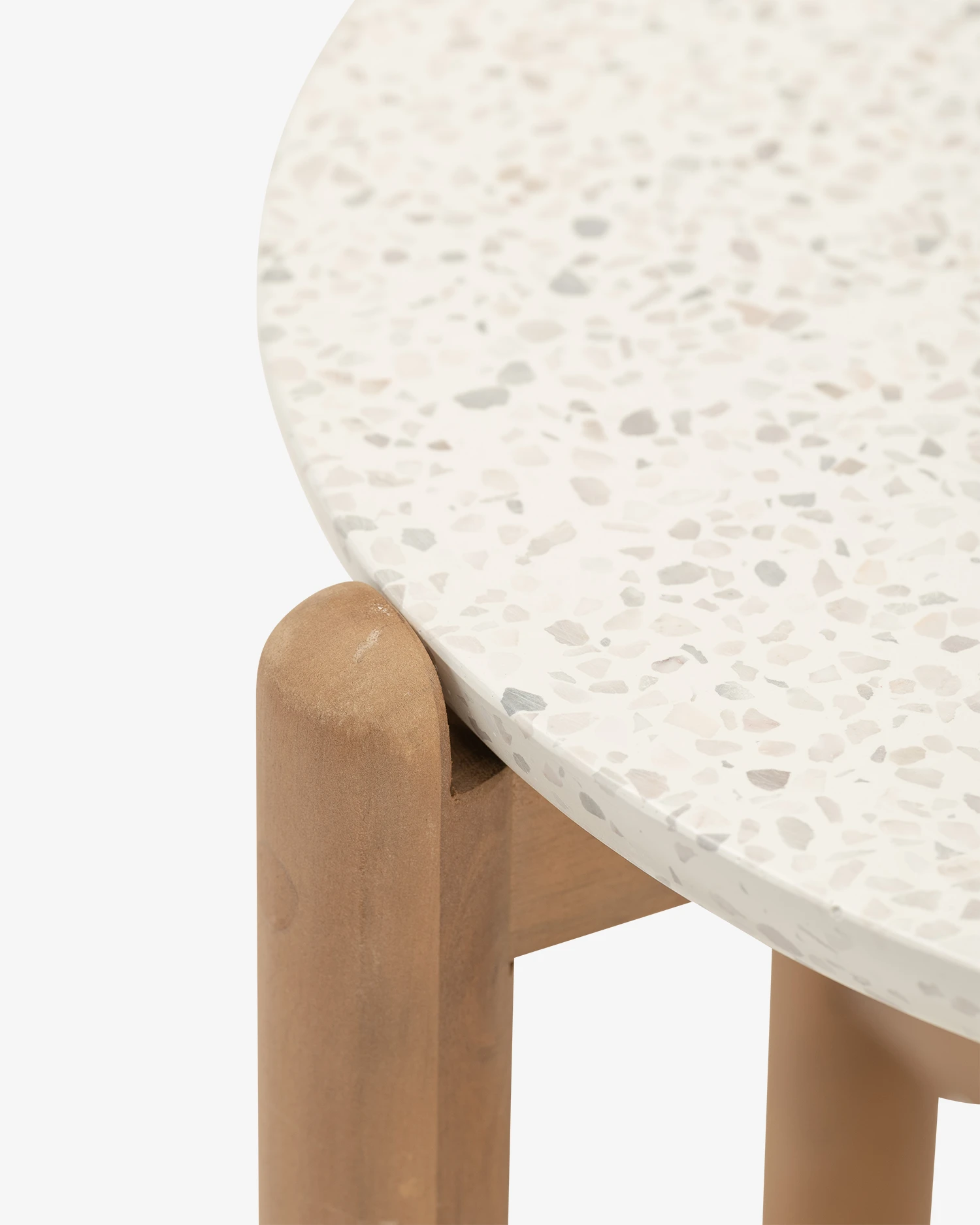 Outdoor table made of wood and white terrazzo